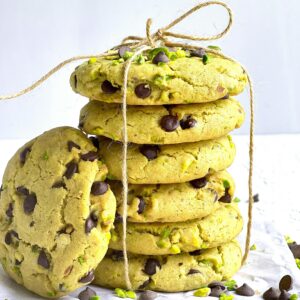 Delicious pistachio cookies with chocolate chips tied with twine. Perfect for a sweet treat.
