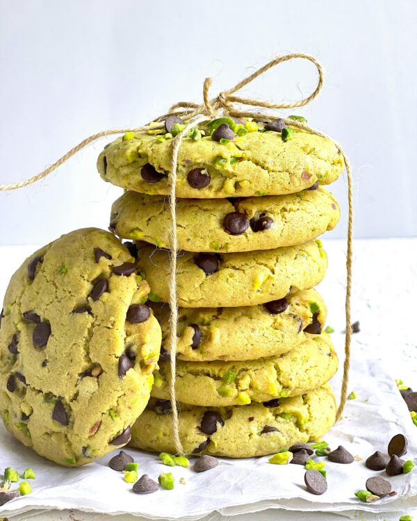 Delicious pistachio cookies with chocolate chips tied with twine. Perfect for a sweet treat.